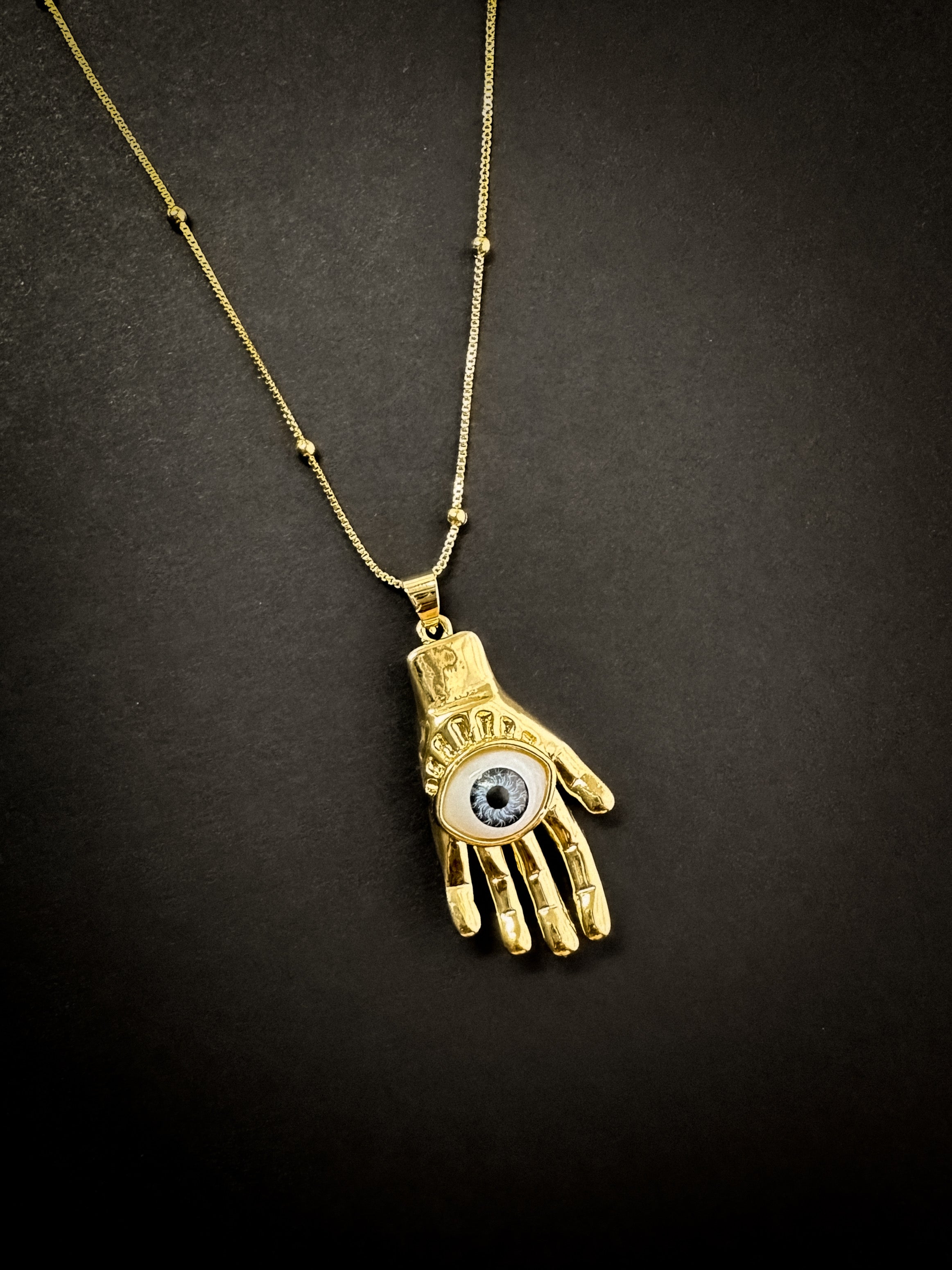 Collar Ojo Mano
