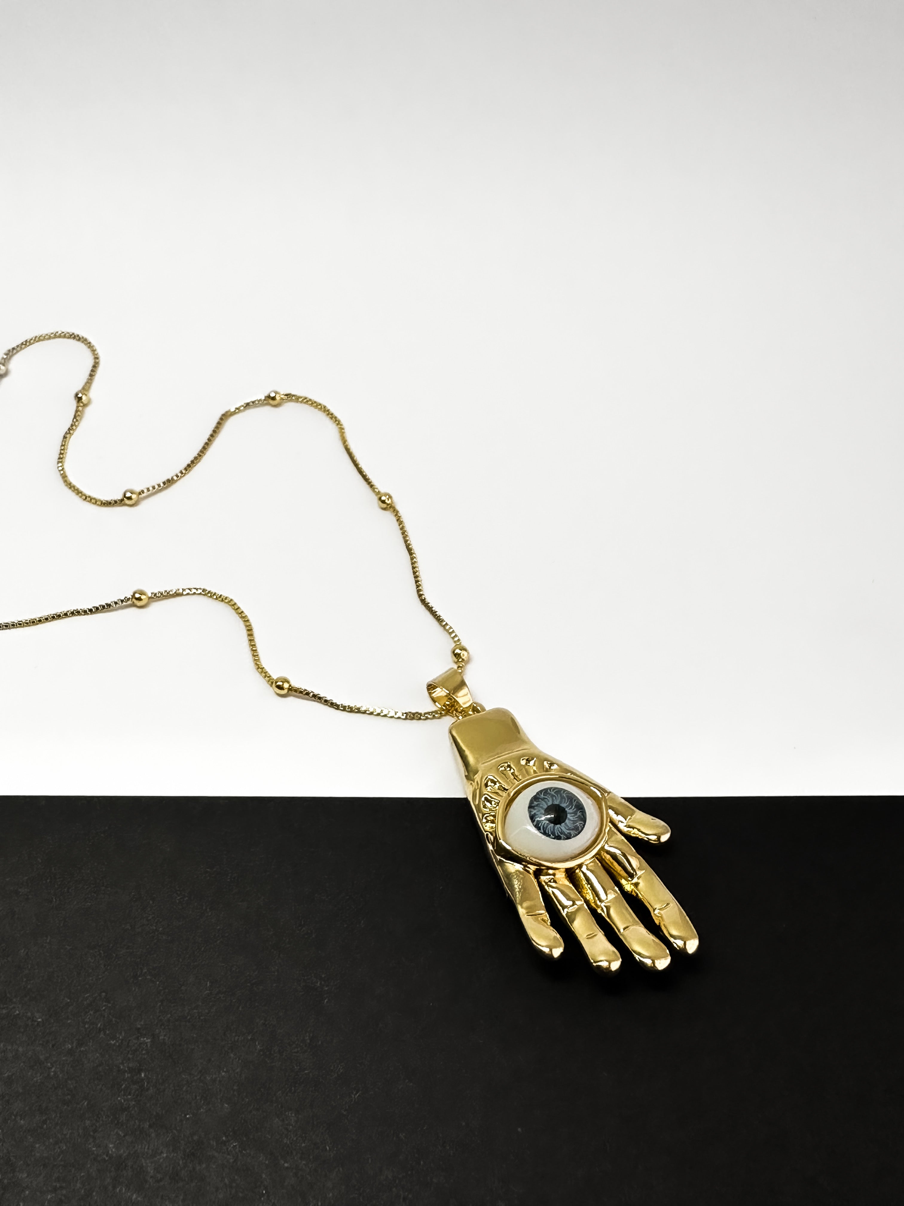 Collar Ojo Mano